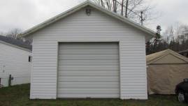 Powerwashing vinyl siding after