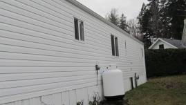 Powerwashing vinyl siding after