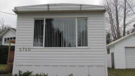 Powerwashing vinyl siding after